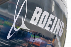 Logo von Boeing., © dpa/Elaine Thompson/AP