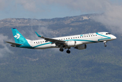 Eine Embraer ERJ-195 von Air Dolomiti vor einem Berghang in der Schweiz., © AirTeamImages.com/AB II