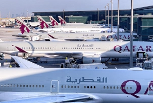 Flugzeuge von Qatar Airways am Flughafen von Doha., © AirTeamImages.com/Paul Buchroeder