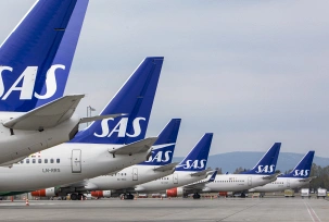 Flugzeuge der skandinavischen Fluggesellschaft SAS stehen am Terminal des Flughafens Gardermoen., © DPA/Ole Berg-Rusten/NTB Scanpix