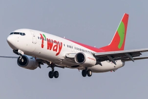 Boeing 737 der Tway Air., © AirTeamImages.com/Felix Gottwald