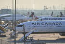Kerosinkosten belasten Ausblick: Air Canada setzt Jahresprognose aus, © DPA/Sammy Kogan