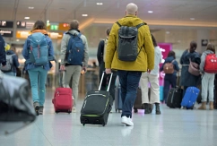 Passagiere mit Handgepäck., © DPA/Malin Wunderlich