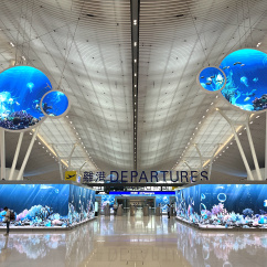 Hong Kong International Airport Terminal 2: In der Mitte geht es in die Departure Area., © Privat/Andreas Sebayang